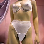 Mannequin in a slash of mesh with Lady Bush